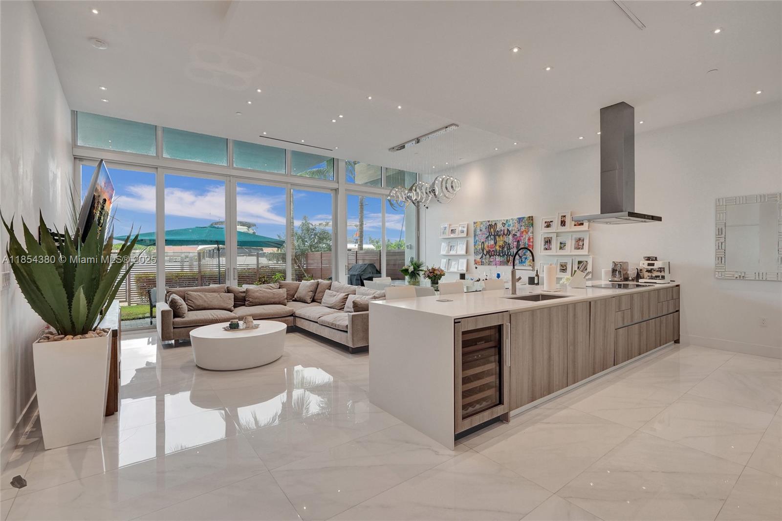Introducing VIDA at The Point- a rare new construction offering in Aventura. This 3-story, 5BD,5.5BA luxury TH features over 3600 sq.ft, MiaCucina kitchen with Wolf appliances, Sub-Zero fridge, wine cooler, quartz counters. Soaring 12-ft. impact windows fill the home with natural light and connect indoor-outdoor living. Enjoy a rooftop terrace with sunset views, perfect for a gym, bar , lounge or summer kitchen.The second floor includes a marina-view primary suite with balcony, 2 additional bedrooms, and a third floor office/5th bedroom. Includes 2-car garage. TH is lined with gas for hot tub or BBQ. Enjoy all the amenities of The Point: 3 pools, 25,000-sf. spa & gym, tennis courts, Juice & Java restaurant and more. Walk to Don Soffer High, shops and houses of worship.