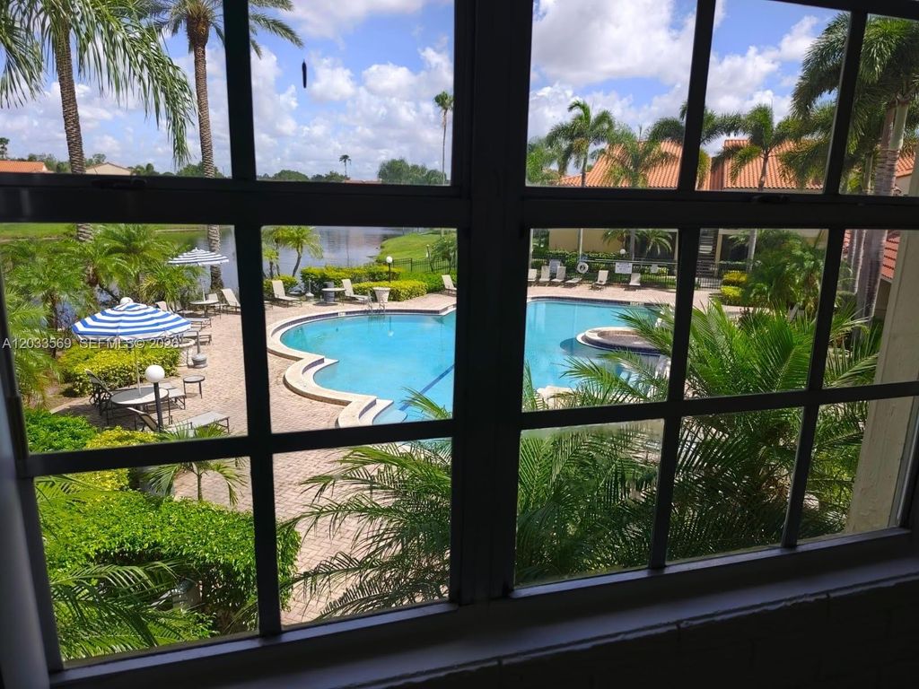 Photo of 1269 SW 46th Ave #2408, Pompano Beach, FL 33069 (MLS # A12033569)