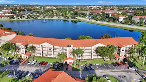 Photo of 13001 SW 11th Ct #401A, Pembroke Pines, FL 33027 (MLS # A11874213)