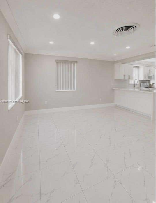 Photo of 5735 Hayes St, Hollywood, FL 33021 (MLS # A12025770)
