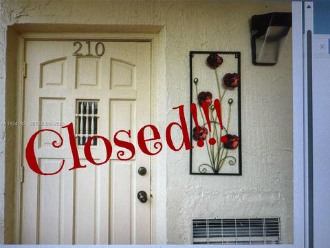 Photo of 9800 N Hollybrook Lake Dr #210, Pembroke Pines, FL 33025 (MLS # A11924192)