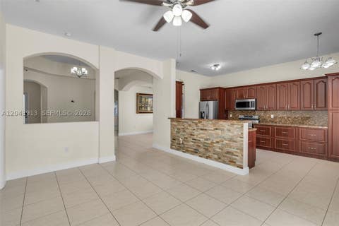 Tiny photo for 8757 NW 139th St, Miami Lakes, FL 33018 (MLS # A12043913)