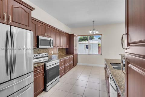 Tiny photo for 8757 NW 139th St, Miami Lakes, FL 33018 (MLS # A12043913)