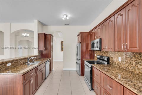 Tiny photo for 8757 NW 139th St, Miami Lakes, FL 33018 (MLS # A12043913)