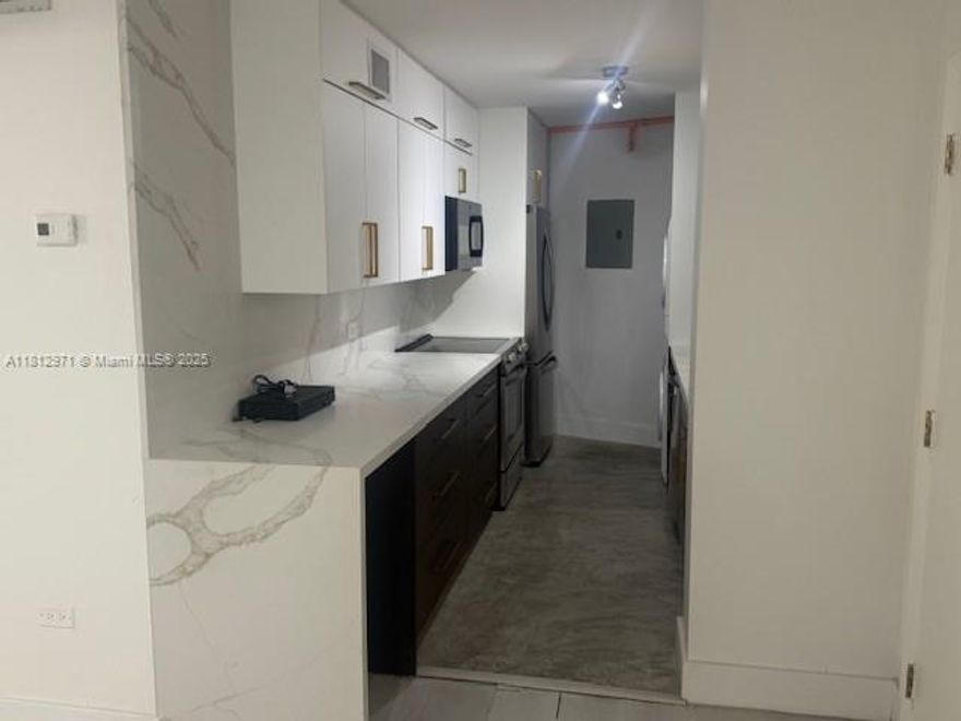 Enjoy the best of South Beach living in this beautifully high-floor 2 bed 2 bath featuring a spacious split-bedroom layout. The fully renovated kitchen boasts contemporary finishes, while vinyl flooring flows throughout the home. Take in endless bay, city, and sunset views, offering a serene escape just two blocks from the beach and Lincoln Road.This residence includes convenient amenities such as a pool, gym, assigned parking. Located off the beach with easy access to the Beachwalk, you’re within walking distance to all the top dining, shopping, and entertainment hotspots that make South Beach iconic.
Pets allowed up to 75lb with pet fee and deposit  Washer dryer  in unit and assigned parking.  24 hour front desk/valet, Pool and Gym   2nd parking space may be available thru association