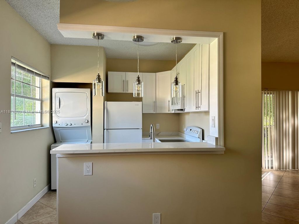 Photo of 820 Cypress Park Way #C2, Deerfield Beach, FL 33064 (MLS # A11874203)