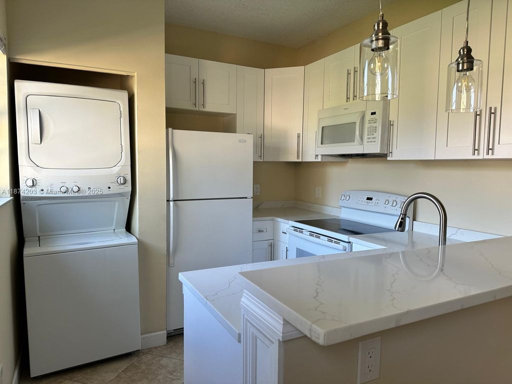 Photo of 820 Cypress Park Way #C2, Deerfield Beach, FL 33064 (MLS # A11874203)