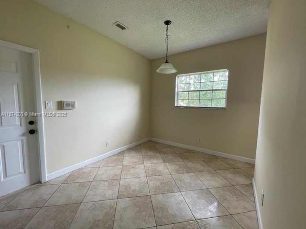 Photo of 820 Cypress Park Way #C2, Deerfield Beach, FL 33064 (MLS # A11874203)