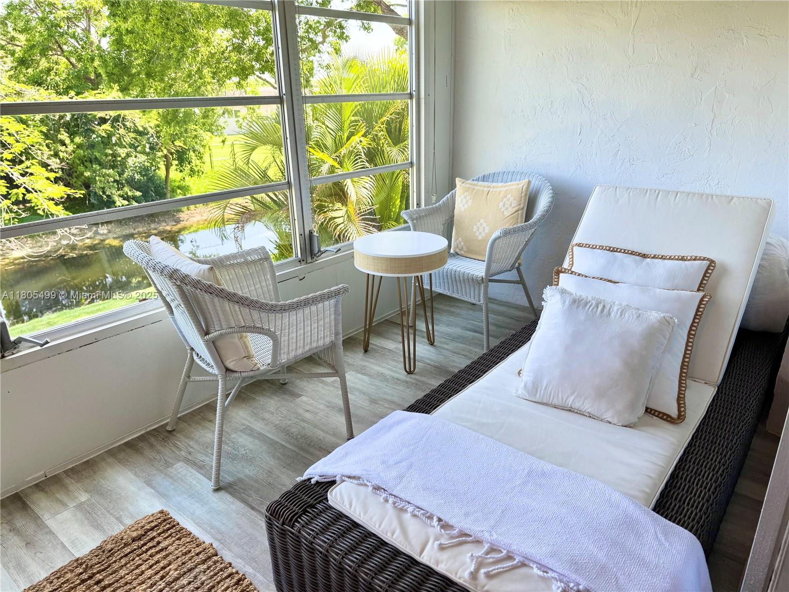Experience luxury and style in this contemporary, renovated 1 Bed, 1.5 Bath gem, professionally designed by a professional interior decorator from NY. No detail spared—skim-coated ceilings, fresh paint, soundproof vinyl plank flooring, and modern finishes throughout. The sleek kitchen features refinished cabinetry, new appliances, and a stunning glass tile backsplash. Enjoy new bathroom vanities, light fixtures, and updated plumbing. New A/C and water heater for year-round comfort. Located in a vibrant 55+ community in Margate, FL with elevator access. Resort-style amenities include 3 pools, tennis courts, gym, a clubhouse, BBQ pavilions, and more. Building has new roof and elevator. No special assestments. Close to golf, shopping, and medical care. A rare find—act fast!