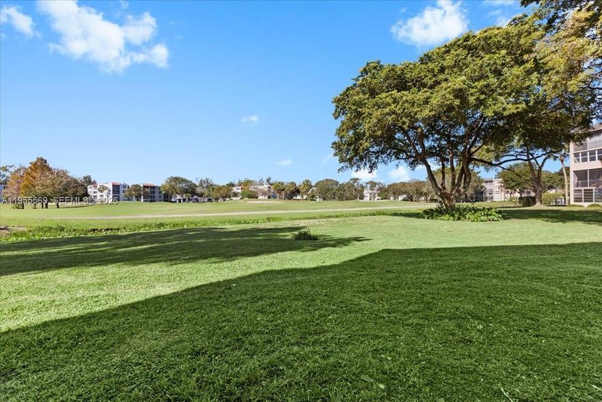Ground-floor 2/2 in Pine Island Ridge Country Club with gorgeous golf views! Includes mandatory club membership with access to 2 restaurants (formal + sports bar), golf, pools, tennis, pickleball, bocce, basketball, saunas, BBQs, and more. Spacious layout, steps from the fairways. Golf bag storage included! Walk to Publix, shops, dining, and movie theater—two plazas at the entrance. Near Nova Southeastern and major highways: 595, Turnpike, I-95, I-75. Resort living in the heart of Davie!