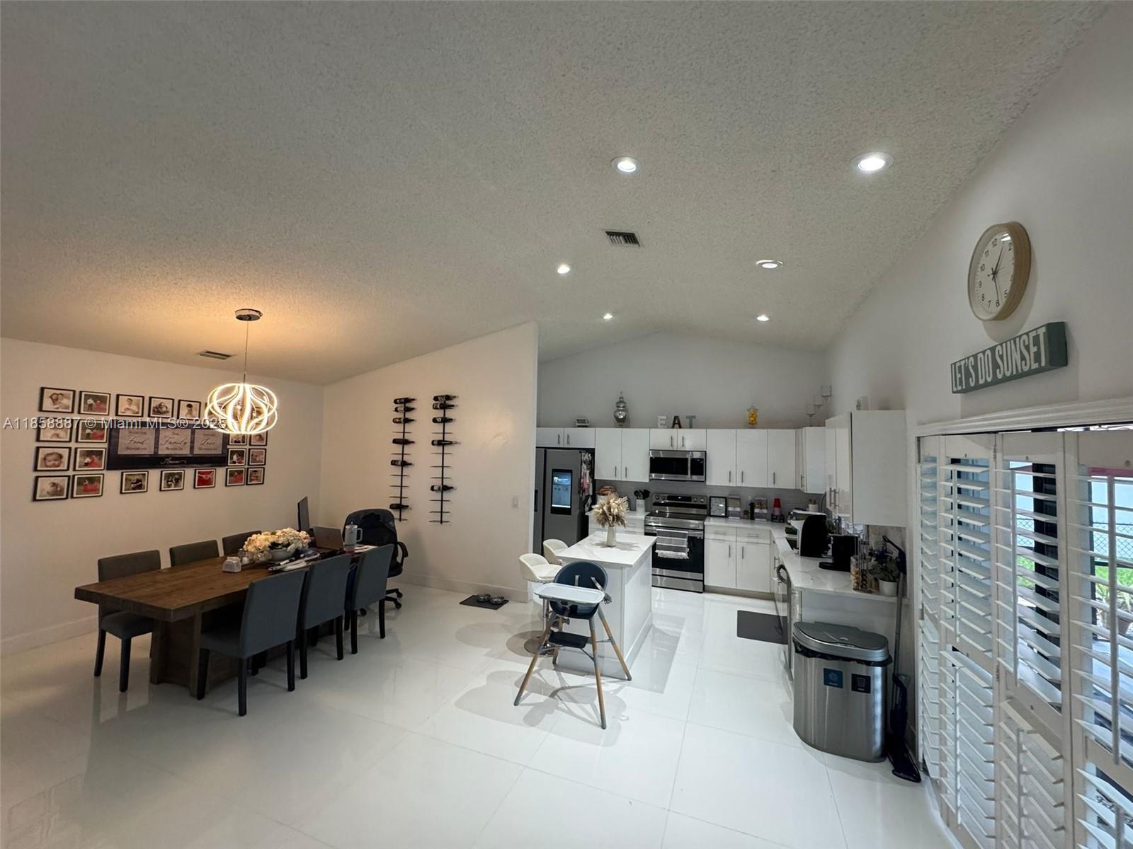 Beautiful remodeled house for sale. This house features new hurricane impact windows, Tesla solar pannel, Tesla wall supercharger, backyard stereo system, water filter system, alarm system, camera system, indoor and outdoor fireplaces, 5 tv's and outdoor tv and more. Do not miss this rare opportunity to enjoy the comfortable living in this amazing stylish upgraded house!