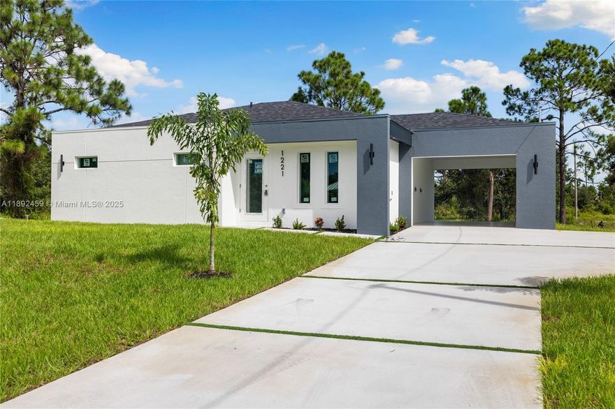 LOCATION! LOCATION! LOCATION! Discover this stunning new construction home in SE Lehigh Acres—perfect for first-time buyers or investors, in a high-growth area of SWFL with easy direct access to Miami, Naples, Fort Myers, Cape Coral, Punta Gorda, Sarasota, Tampa! Offering nearly 1,100 sq ft, this modern open-concept design features 3 beds, 2 baths, and a covered carport with epoxy floor. Enjoy a chef-inspired kitchen with quartz countertops, stainless steel appliances, and soft-close cabinets. The master suite boasts a walk-in closet and glass shower. Home includes tile floors, impact windows, washer/dryer, irrigation, in-wall pest system, and space for a future pool. Additionally, it comes with the 2-10 Home Buyers Warranty, ensuring comfort and quality of life in the growing SWFL area.