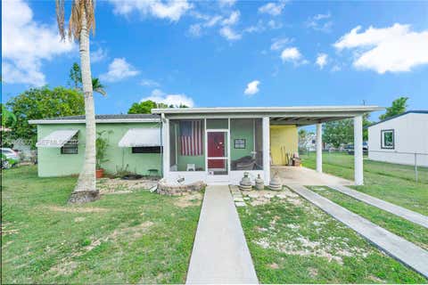 Photo of 1570 NE 15th St, Homestead, FL 33033 (MLS # A12009003)