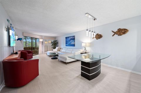 Photo of 7443 Fairfax Dr #208, Tamarac, FL 33321 (MLS # A11806747)