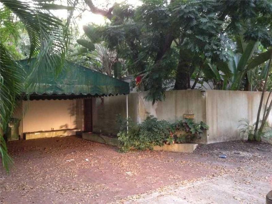 spacious home, sourrounded by great garden areas and trees, very private . tile throughout, lots of possibilities and potential. Excellent location.