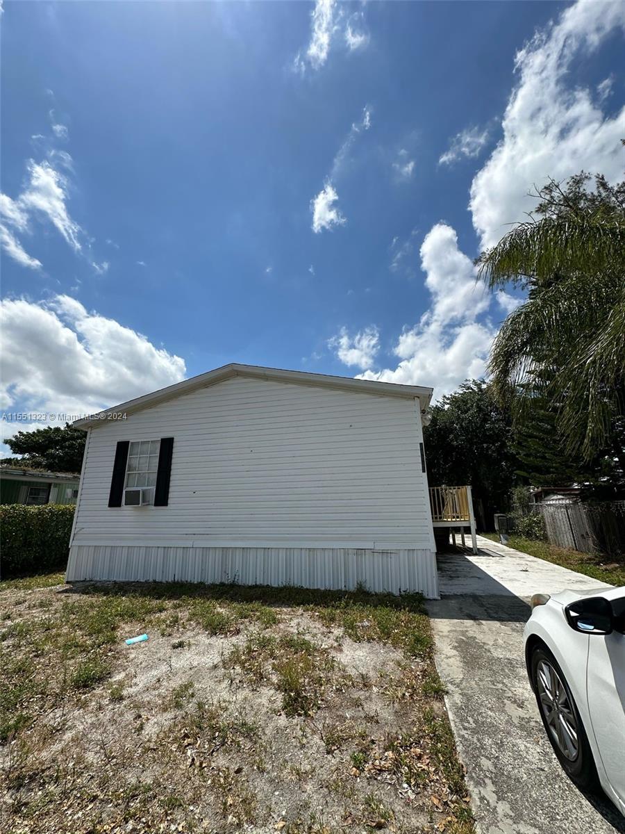 Beautiful and spacious 3/2 Mobile home in West Boca Raton, freshly painted, new vinyl flooring, and clean. Walking distance to shopping, restaurants, and more. Mobile home community. Easy approval with verified income and credit.