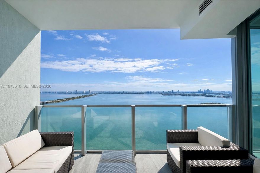 Wake up above the water.
Arrive in complete privacy via your private elevator, opening into an exclusive foyer, an immediate statement of sophistication.
Walls of floor-to-ceiling glass frame sweeping panoramic views of Biscayne Bay, the blue Atlantic Ocean, Miami Beach, the Venetian Islands, and Sunny Isles. From sunrise over open water to glowing city lights at dusk, the scenery becomes part of everyday living.
The sleek European-style kitchen is appointed with Miele appliances, custom light wood cabinetry, and refined finishes — designed for seamless entertaining and elevated daily life. STORAGE UNIT included.
Beyond the residence, indulge in resort-level amenities including a stunning Biscayne Bay waterfront pool decks, private beach-style lounging, fitness center, spa services, tennis courts, and full-service concierge.
A rare combination of privacy, views, and uncompromising quality.
Me, People & Places