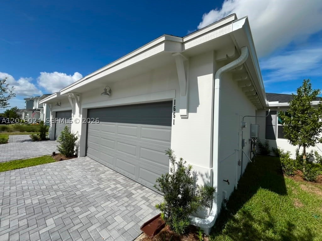 Photo of 1651 Pelican Post Pl #1651, Loxahatchee, FL 33470 (MLS # A12076024)