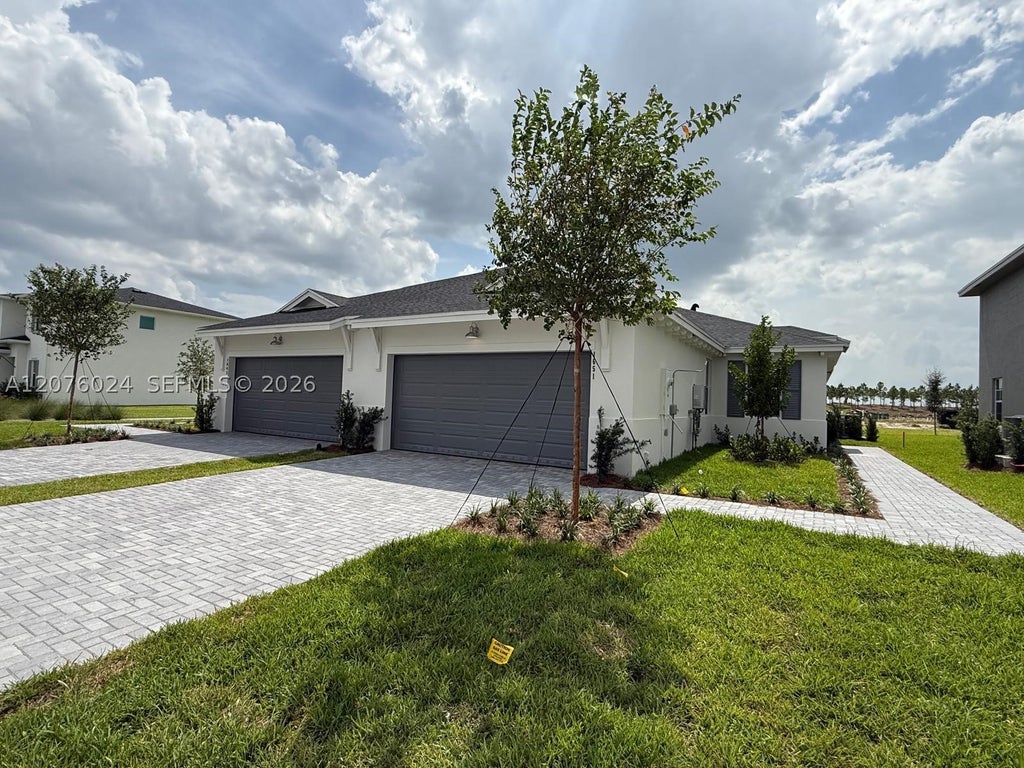 Photo of 1651 Pelican Post Pl #1651, Loxahatchee, FL 33470 (MLS # A12076024)