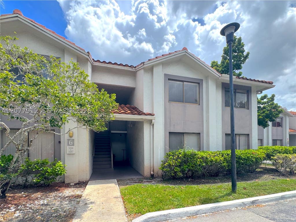 Photo of 3287 Coral Lake Dr #3287, Coral Springs, FL 33065 (MLS # A12077912)