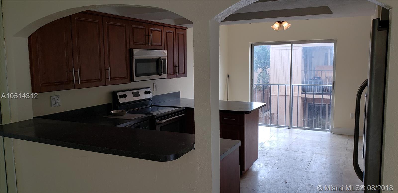 BEAUTIFUL 3 BEDROOM AND TWO AND HALF BATH TWO STORY TOWN HOME, LIVING , DINNING AND ALL BEDROOMS IS ALL TILES, WASHER & DRYER, WOOD KITCHEN W/GRANITE COUNTER TOPS, S.S APPLIANCES.UNIT CONVENIENTLY LOCATED ACROSS THE PARK WITH CHILDREN PLAYGROUND, GYM, BASKETBALL COURT, BBQ AREA, PUBLIC LIBRARY