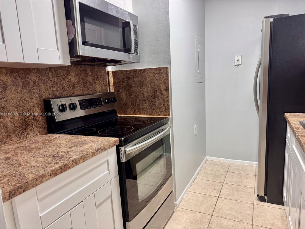 Photo of 1186 Lake Terry Dr #C, West Palm Beach, FL 33411 (MLS # A11860700)