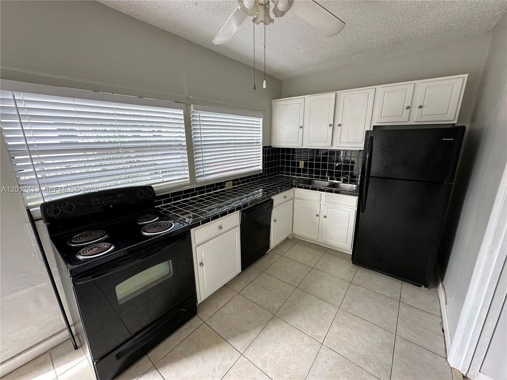Photo of 2443 Cleveland St #2, Hollywood, FL 33020 (MLS # A12012413)