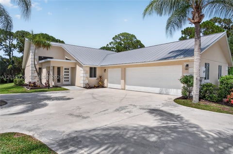 Photo of 4101 SW Bimini Cir N, Palm City, FL 34990 (MLS # A12050129)