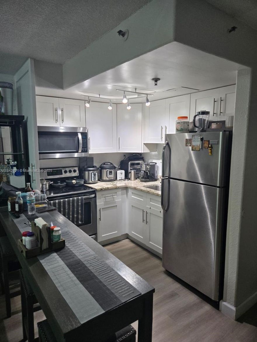 Excellent opportunity to own this beautiful one-bedroom, one bathroom apartment in Miami. Remodeled kitchen and bathroom, vinyl floor throughout apartment and porcelain tiles in bathroom.  HOA fee includes electricity and water.  Perfect for investors.