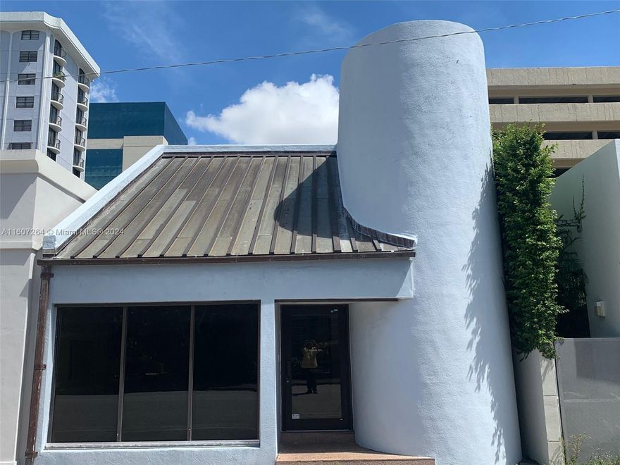 Introducing 55 Almeria Avenue - a prime two-story Coral Gables office building offering approximately 3,464 SF of rentable space within a gross area of 3,700 SF. Featuring on-site parking for four vehicles, this attractive building is perfect for owner-users like law firms, accountants, or other professionals seeking a central location.  business today!  Nestled in the vibrant community of Coral Gables, this free-standing office building offers a rare blend of distinctive architecture and prime location. Boasting a first floor and mezzanine layout, this property provides ample space for various business needs while exuding a modern aesthetic that sets it apart from the traditional Spanish-style buildings in the area.
