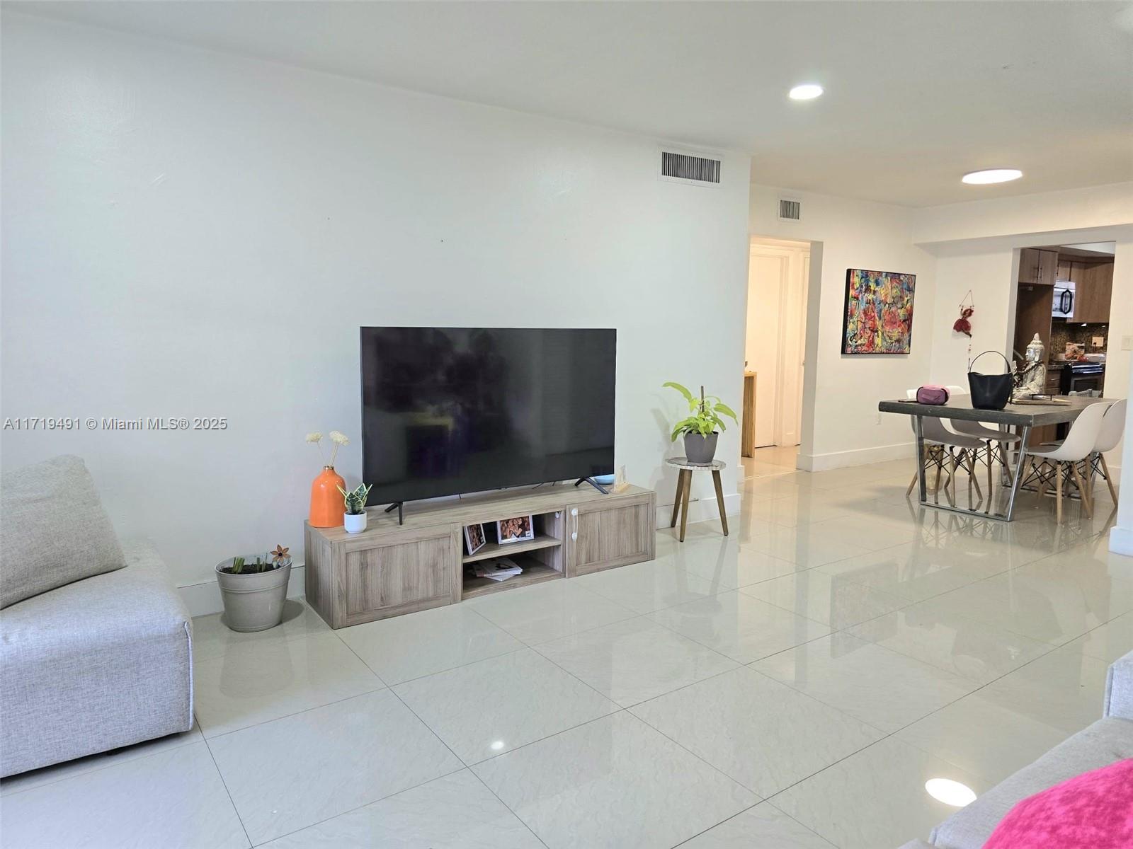 VILLAGE AT DADELAND CONDO - Residential
