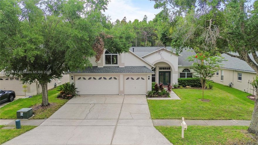 Fully remodeled and move-in ready, this spacious 4-bed, 3-bath home offers a 3-car garage and a large upstairs additional room. The open floor plan features extra-high ceilings and a triple-split layout, perfect for modern living. The home backs up to conservation, providing privacy with no rear neighbors. The Arbor Greene community has a clubhouse with a pool, tennis courts, pickleball, and more. It’s ideally located near top-rated schools, grocery stores, restaurants, and Wiregrass Mall. With easy access to major roads, hospitals, and parks, you’re just 20 minutes from Busch Gardens, 30 minutes to Tampa International Airport, and an hour to Disney. Don't wait, this won't be on the market long! Please call or email for showings.