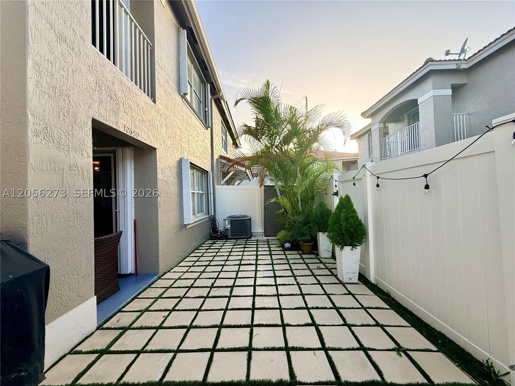 Photo of 12659 SW 54th Ct #12659, Miramar, FL 33027 (MLS # A12056273)