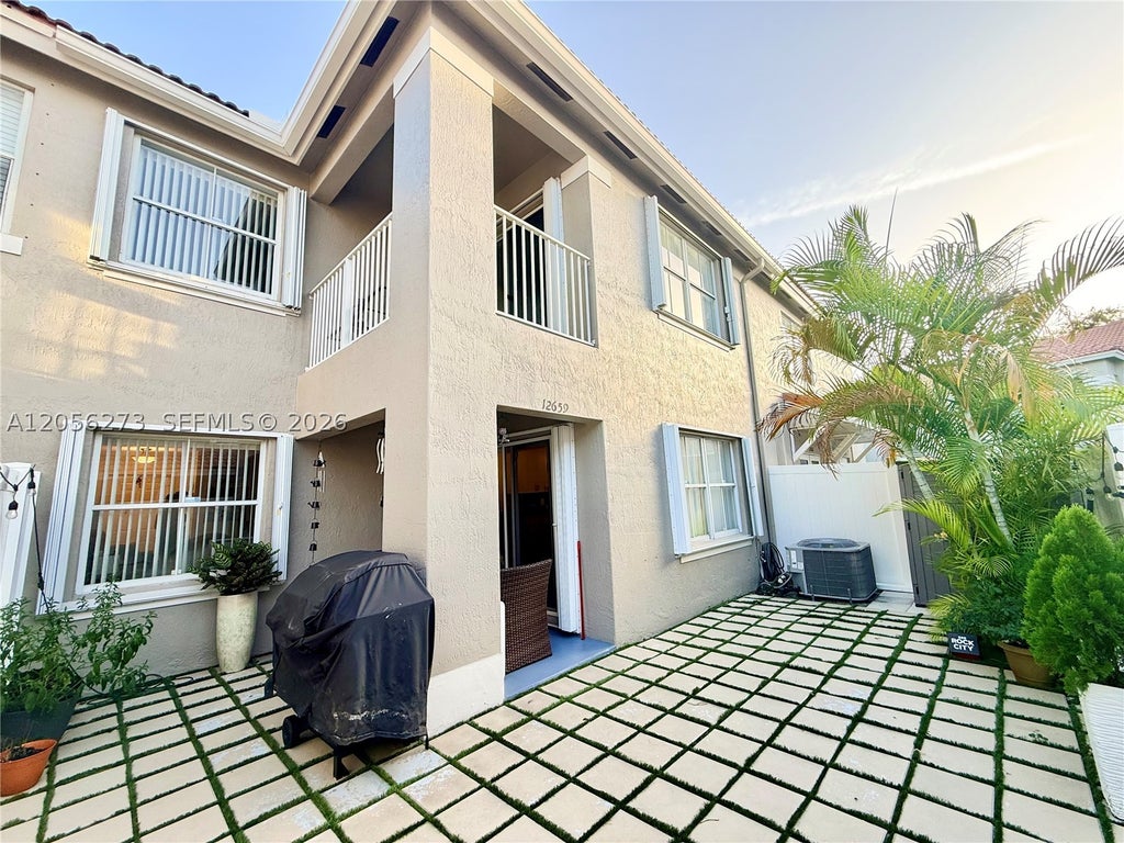 Photo of 12659 SW 54th Ct #12659, Miramar, FL 33027 (MLS # A12056273)