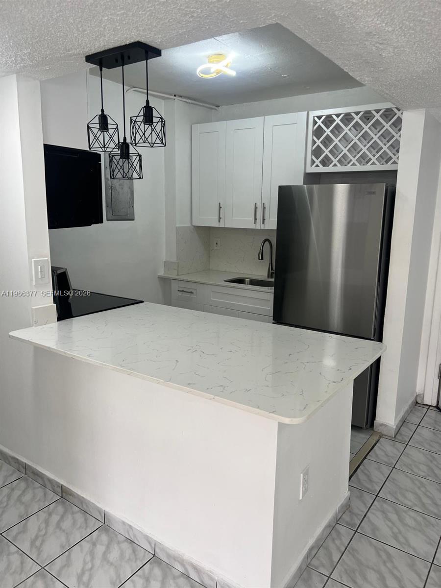 TOWERS NORTH CONDO - Residential Lease