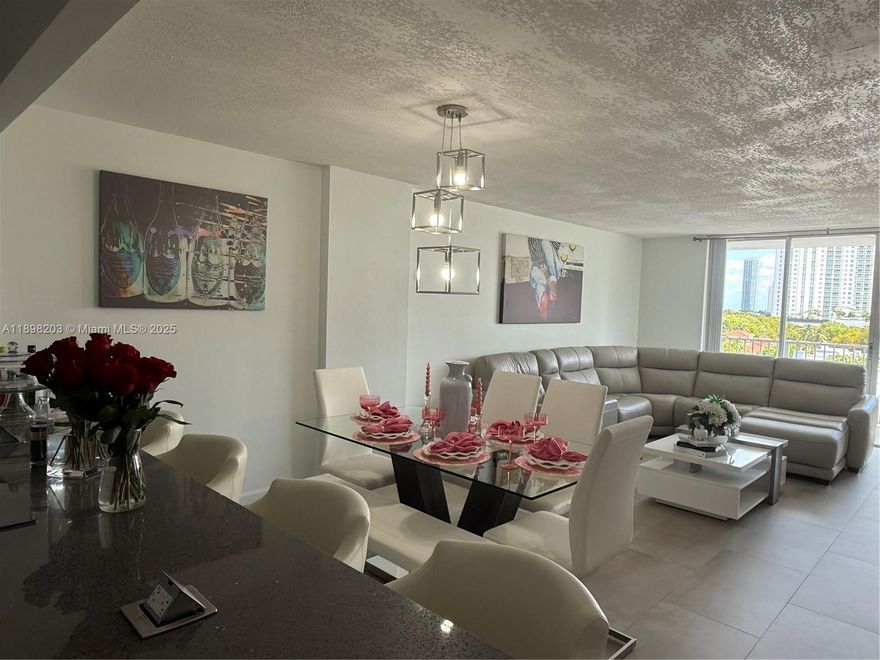 Modern Aventura condominium. The unit has been completely renovated. The apartment is flooded with natural light.  Features oversized living room with stunning views perfect for entertaining. Chef's kitchen with top of the line appliances. Beautiful tile floors and a spacious custom closet. Large master suite. Fully furnished and ready to move in!
Admiral's Port is a full service condominium with 24-hour guard, well stocked fitness center, library, pools, and much more. Great location near the beach, Aventura Mall and many great restaurants, shops and schools.
All the furniture is included in the sale. The existing couches included are the leather couches in the first two pictures. Stationary bike is not included.
****CALL LISTING AGENT TO ARRANGE SHOWINGS****