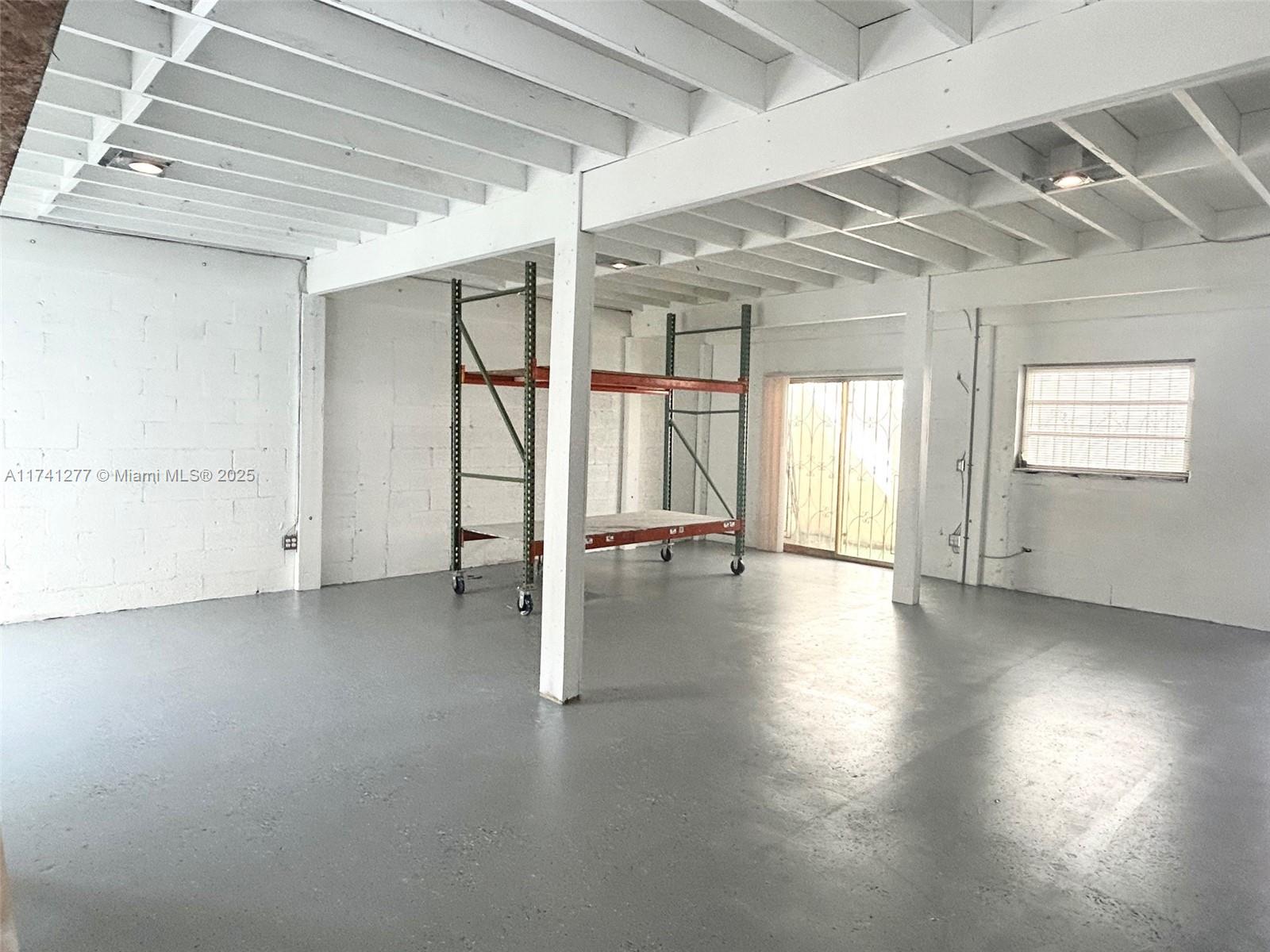 This amazing free-standing building is located in a prime location right next to the Fort Lauderdale Airport.
This property offers abundant parking space both in the front and back, ensuring a convenient experience for customers and clients alike. 1 Bay with 10FT CEILING Height...