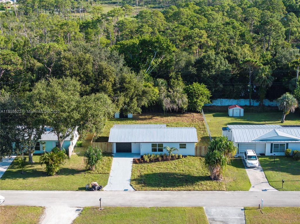 Photo of 2319 NW Sunset Blvd, Jensen Beach, FL 34957 (MLS # A11855522)