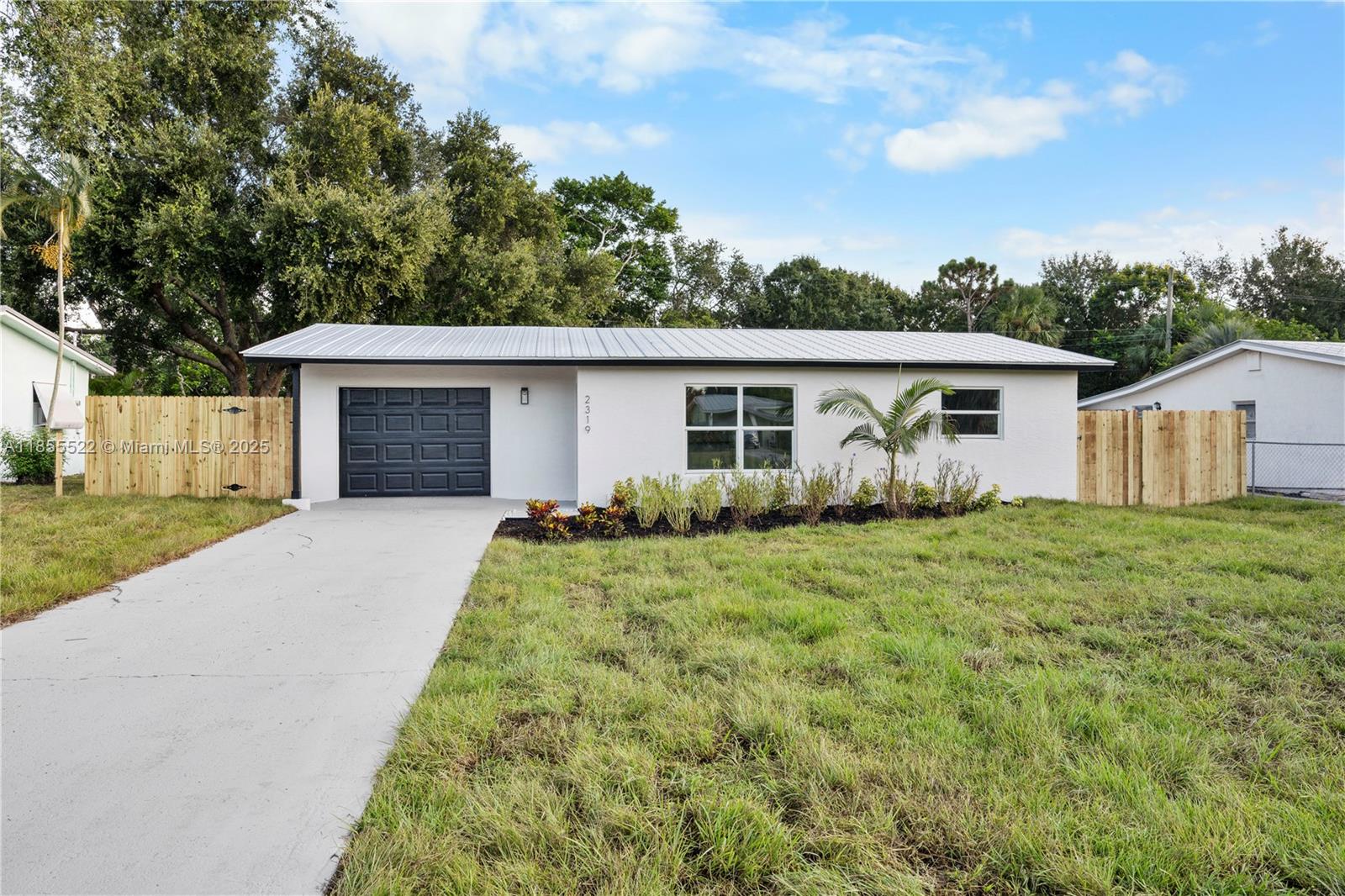 Coastal charm meets modern upgrades! This fully renovated home is 100% move-in ready. Major updates include a 2018 metal roof, 2018 hurricane impact glass, and a brand-new HVAC system (2025). Inside, you’ll find all new flooring, and a stunning remodeled kitchen with granite countertops. Every detail has been touched—new doors, trim, interior and exterior paint—creating a bright, welcoming space. Step outside to your beautifully landscaped yard with fresh sod, perfect for relaxing in the Florida sunshine or hosting friends. Located just minutes from Jensen Beach’s sandy shores, boutique shopping, dining, and top-rated schools, this home offers the ultimate coastal lifestyle. Don’t miss your chance to own this turnkey gem—all the work has been done, you just need to move in!