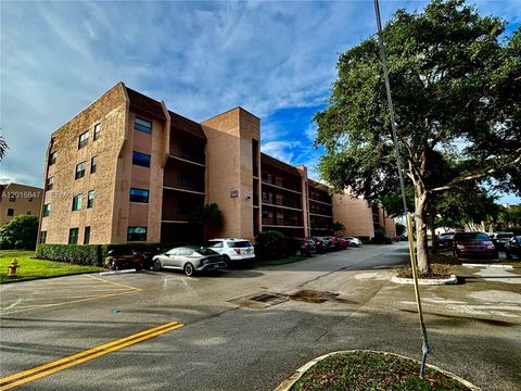 Photo of 10451 Sunrise Lakes Blvd #205, Sunrise, FL 33322 (MLS # A12016847)