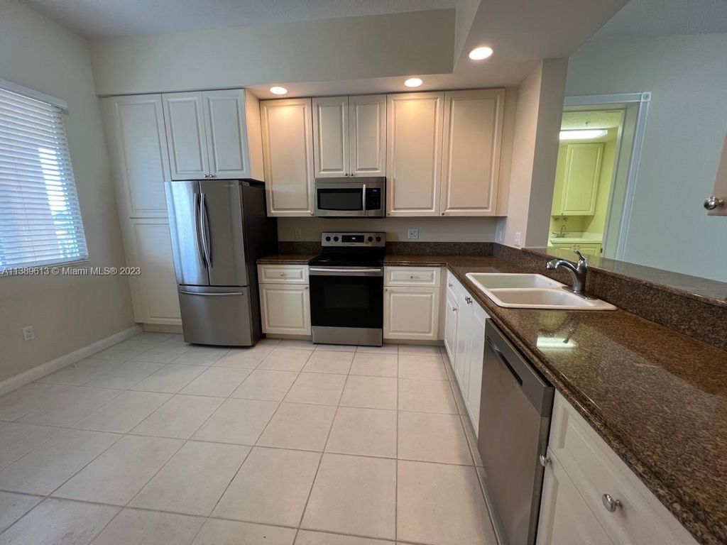 Photo of 5 E Harbour Isle Dr E #306, Fort Pierce, FL 34949 (MLS # A11389613)