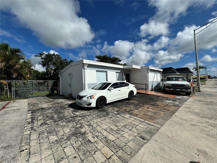 Broker LLC is pleased to present the exclusive sale of a commercial building on a prime main street in Hollywood. Currently, the property is rented as two dwelling units on a month-to-month basis, generating $1,500 and $1,800 per month, respectively. The property is zoned for moderate commercial development, allowing for a mix of retail stores, service businesses, and office spaces. It features an 815-square-foot building situated on a spacious 5,388-square-foot lot with a backyard. This is a rare opportunity to own a versatile property in a highly sought-after area. SELLER FINANCING AVAILABLE.