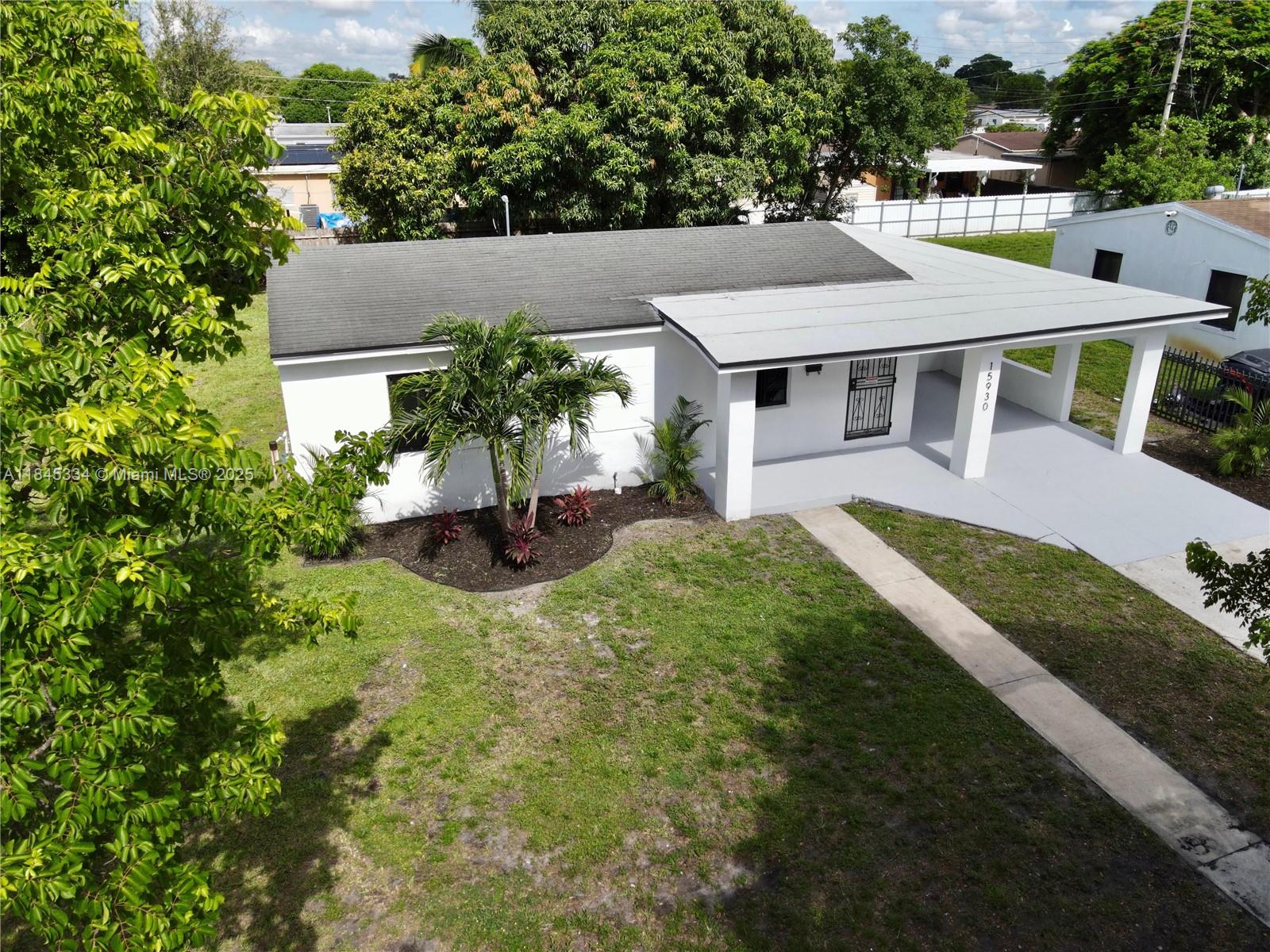 The move-in ready, centrally located property you've been searching for is finally on the market! Walk through your future 1,200+ sq.ft.,3 bedroom/1 bathroom home. This lot comes complete with 7,800 square feet, a fenced in backyard, plenty of front yard space and a completely renovated house that is the desired blank slate for your personalization. Feel secure and stay dry when you're pulling in your clean and freshly painted carport that is attached to the driveway which can easily park you and your guests cars. Enter and experience new windows, new floors, new kitchen, new bathroom and bedrooms that are simply awaiting your decorative touch.Whether you are looking for an investment property or you're ready to purchase your next home, you won't regret taking a look at this property.