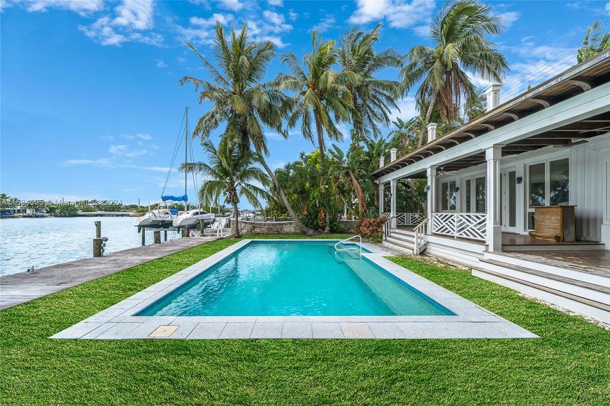 Discover this amazing opportunity sitting on a lushly landscaped 10,500 SF lot in a prestigious neighborhood on San Marino Island. Build your dream home or renovate the existing 2-story, 4BR/3+1BA waterfront home. Offers 3,621 ADJ SF w/spacious living, dining, and family areas plus a large kitchen all with water views. The second-floor principal suite features a large entertainment deck that overlooks the pool and bay. A covered ground floor wood deck with bar, a large pool, a private dock, direct bay access and amazing water views. Great location just minutes to Miami Beach, fine dining and shopping, downtown Miami, cultural and sports venues, the Design District, Wynwood, and Miami International airport. This home is a must see.