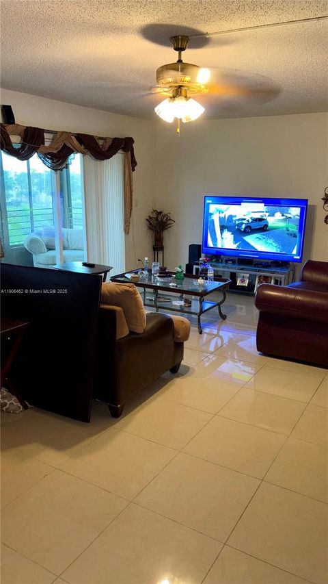 Photo of 3120 N Pine Island Rd #307, Sunrise, FL 33351 (MLS # A11906462)