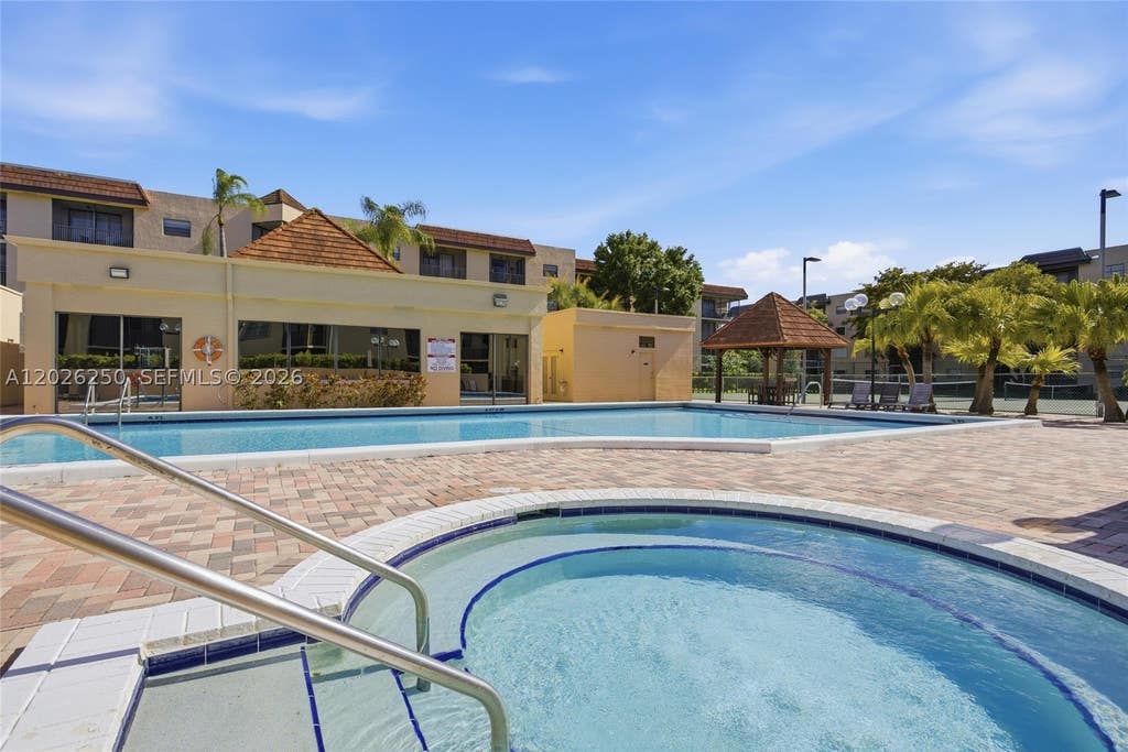 Photo of 10451 W Broward Blvd #209, Plantation, FL 33324 (MLS # A12026250)