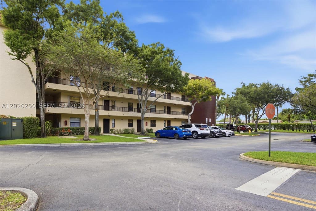 Photo of 10451 W Broward Blvd #209, Plantation, FL 33324 (MLS # A12026250)