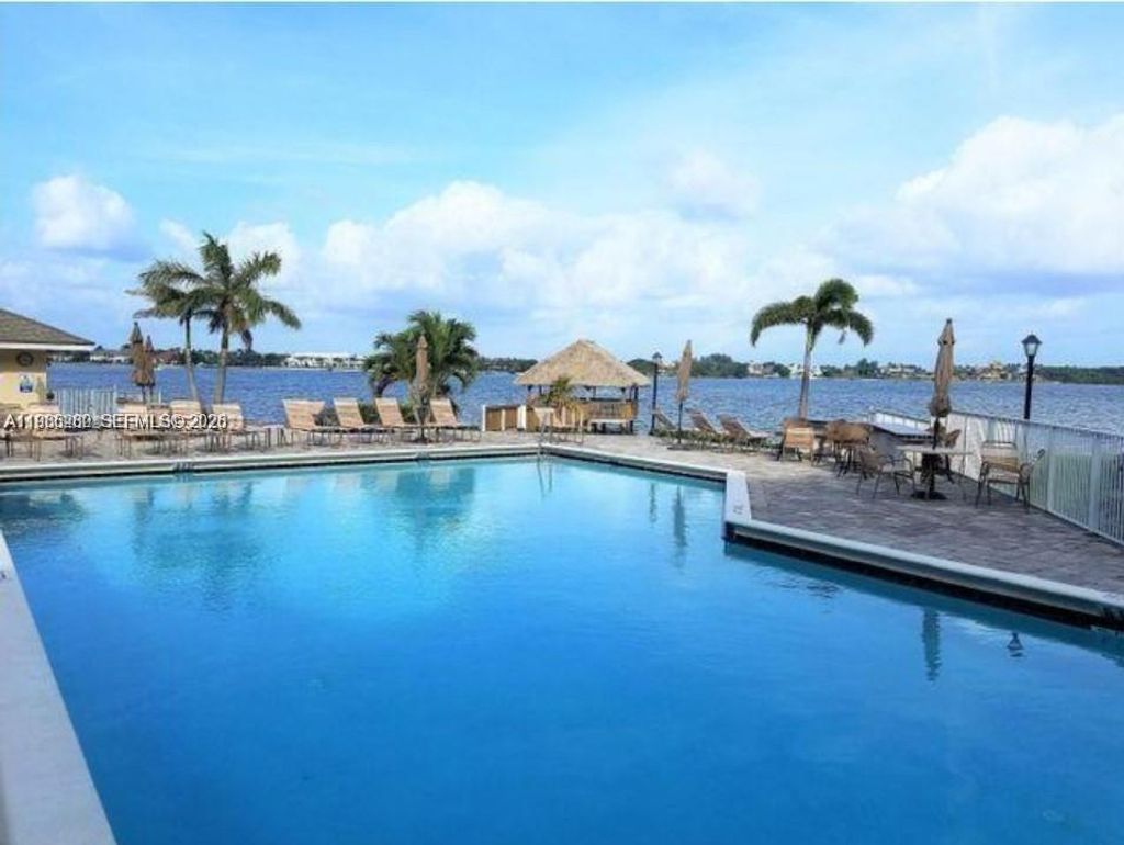 Photo of 51 N lakeshore Dr #51, Hypoluxo, FL 33462 (MLS # A11965260)