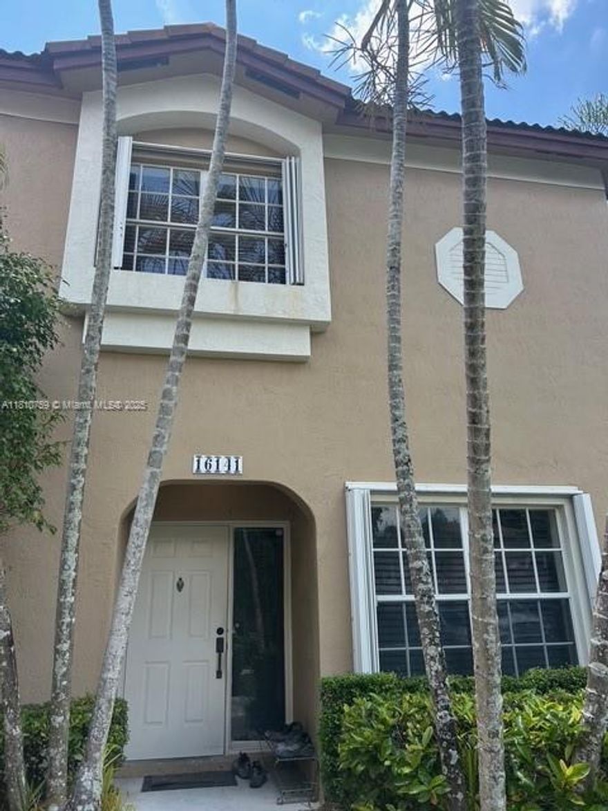 Emerald Courts Weston 2 bedrooms, 2.5 bathroom townhome. This property is located in a courtyard of homes and features an open floor plan with ceramic on the first floor and laminate wood floors on the entire second floor. Two assigned parking spaces #55