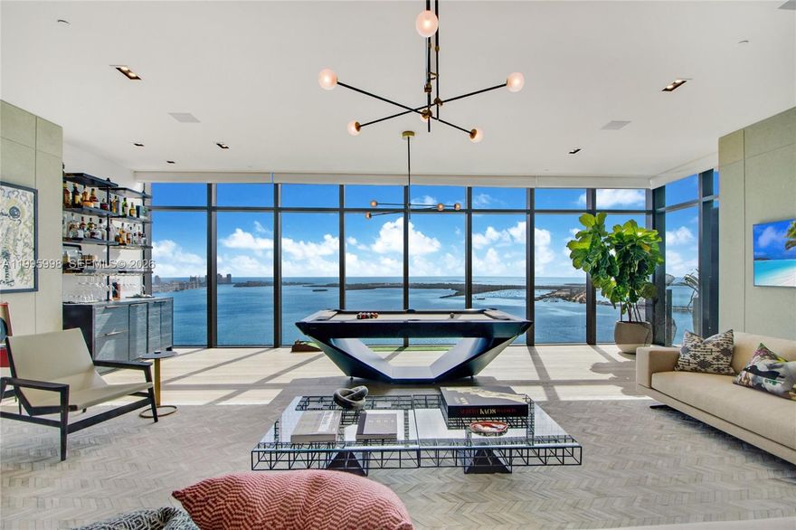 BREATHTAKING, UNOBSTRUCTED WATER VIEWS FROM EVERY ROOM OF UNIT 4301 offering a level of detail and customization rarely found in the building. A true one-of-a-kind turnkey furnished residence in Echo Brickell- Miami’s most exclusive boutique building with just 172 residences, designed by Carlos Ott. Fully move-in ready, this modern, ultra-luxurious smart home is designed for elevated, high-end living and next-level entertaining. Custom-designed and fully furnished with Italkraft cabinetry, Sub-Zero & Wolf appliances, wood floors, and hidden doors throughout, the residence features 2 bedrooms, 2.5 bathrooms, and approximately 4,000 SF of interior living space (as per owner). Floor-to-ceiling windows create a light-filled residence with spectacular direct water views from every spacious room. A space that delivers impact the moment you walk in—expansive living area anchored by a statement kitchen island, seamlessly connected to a private playroom with drop-down projector, fireplace, pool table, and custom bar with wine cellar. The terrace extends the experience outdoors with a built-in BBQ and open water backdrop. Primary suite with massive custom walk-in closet and spa-style bathroom. Resort-style amenities include infinity-edge pool, 2 Jacuzzis, fitness center, 24/7 concierge, valet, and more. A rare, fully turnkey residence for the buyer who values design, privacy, views, and presence.